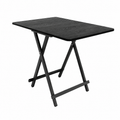 Black folding table with wood-grain top and metal legs.