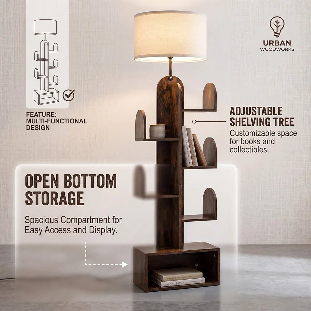 A tall wooden floor lamp styled as a shelving unit with a cylindrical drum lampshade, adjustable side shelves holding books, and an open bottom storage compartment. The image includes marketing text callouts and the Urban Woodworks logo on a light gray textured background.