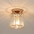 Ceiling light fixture with gold accents on a neutral background