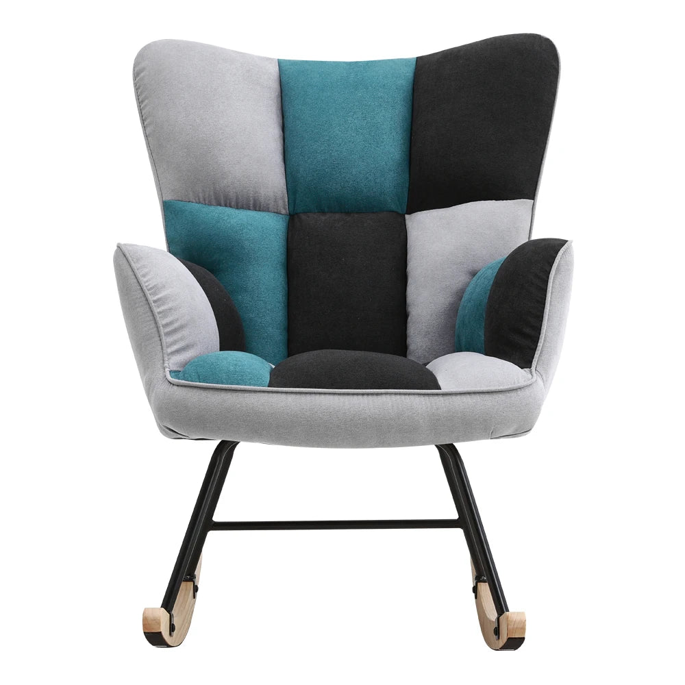 Modern armchair with a patchwork design in gray, blue, and black on a white background