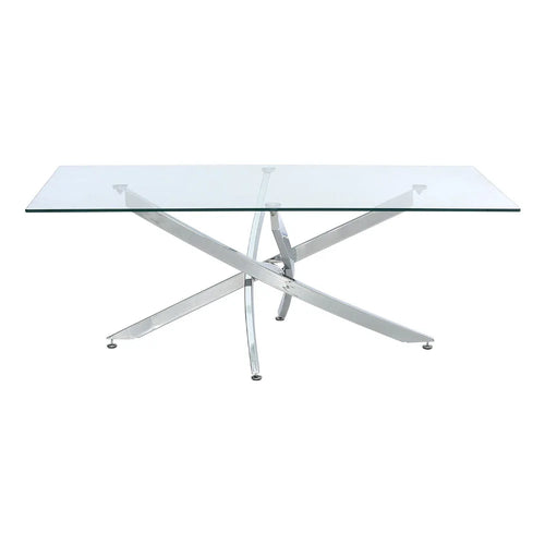 Glass dining table with metal legs on a white background