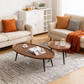 Living room with beige sofas, wooden coffee table, and a white cabinet.