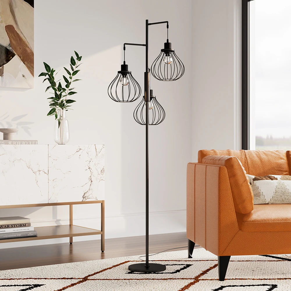 Modern floor lamp with wire cage design in a living room setting.