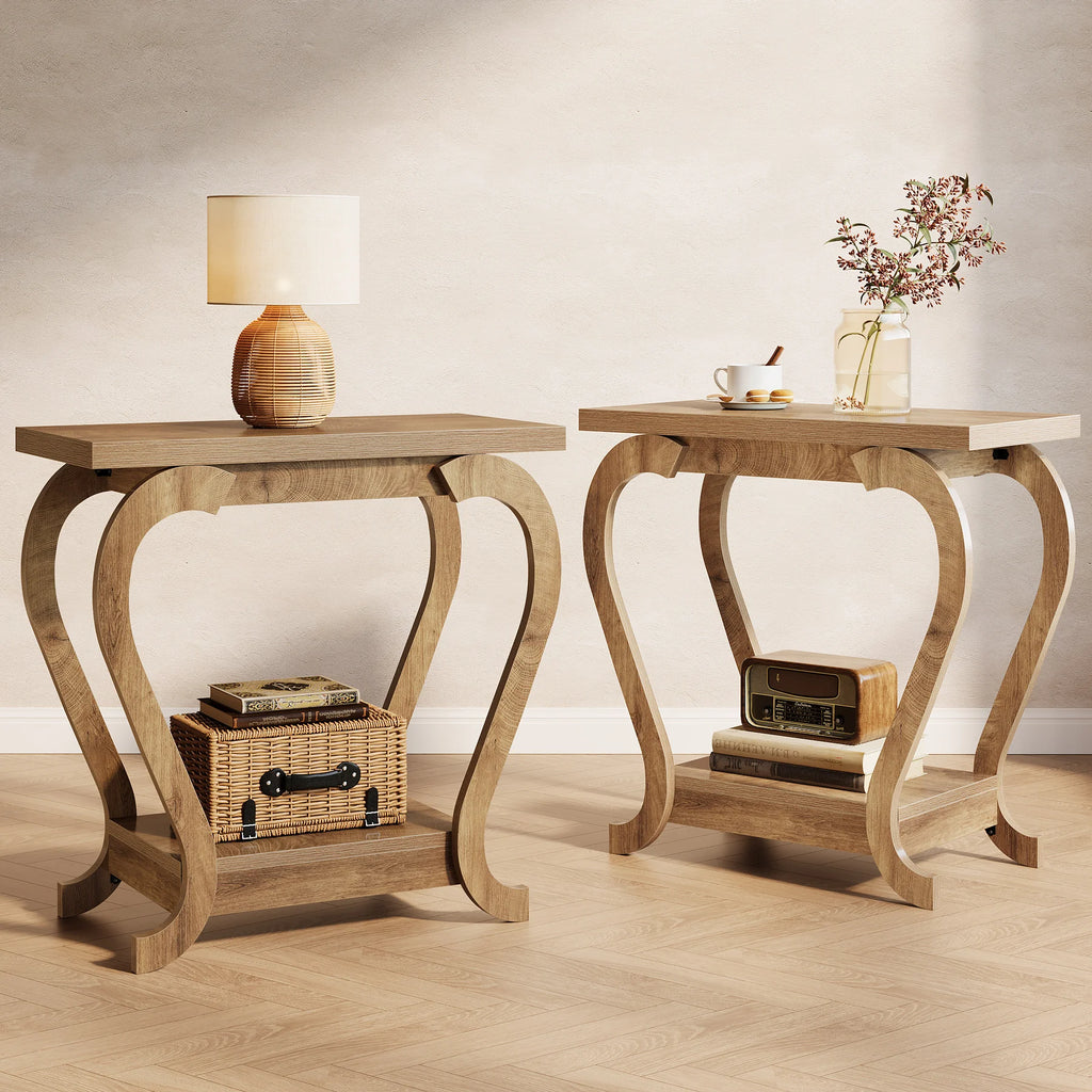 Two wooden side tables with decorative items on a light wood floor.