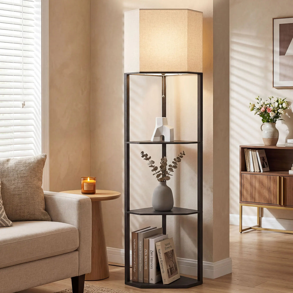 Living room with a corner shelf, lamp, and books