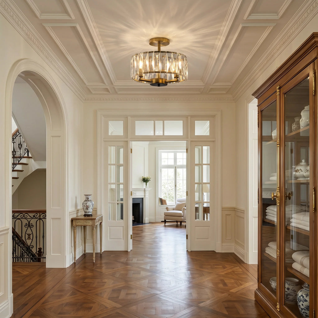 Luxurious interior of a home with wooden floors, elegant lighting fixture, and decorative elements.