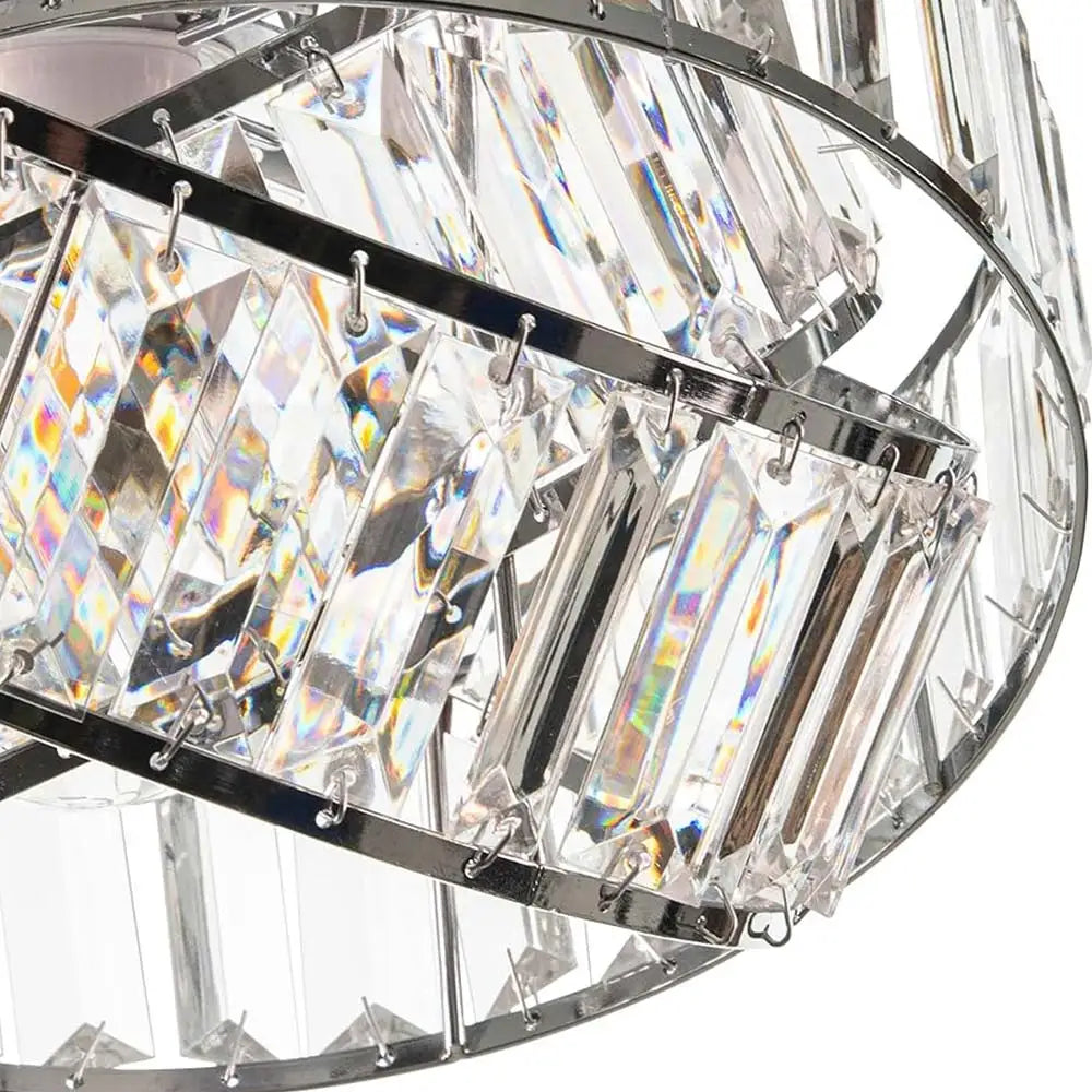 Crystal chandelier with clear and silver design on a white background