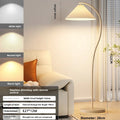 Floor lamp with light color options in a living room setting