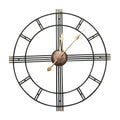 Oversized black metal wall clock with open-frame design and gold hands.