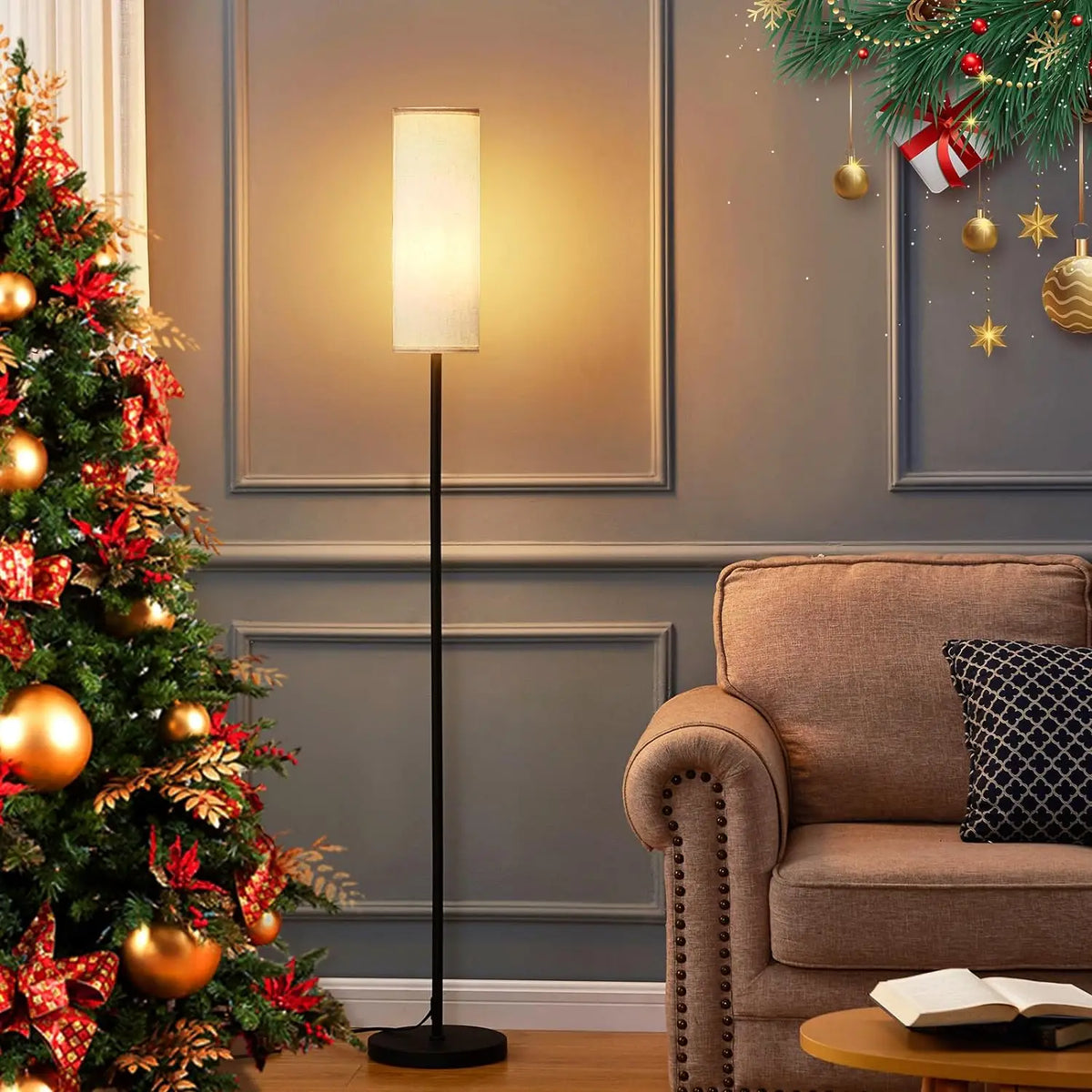 Living room with a Christmas tree, floor lamp, and decorated wall