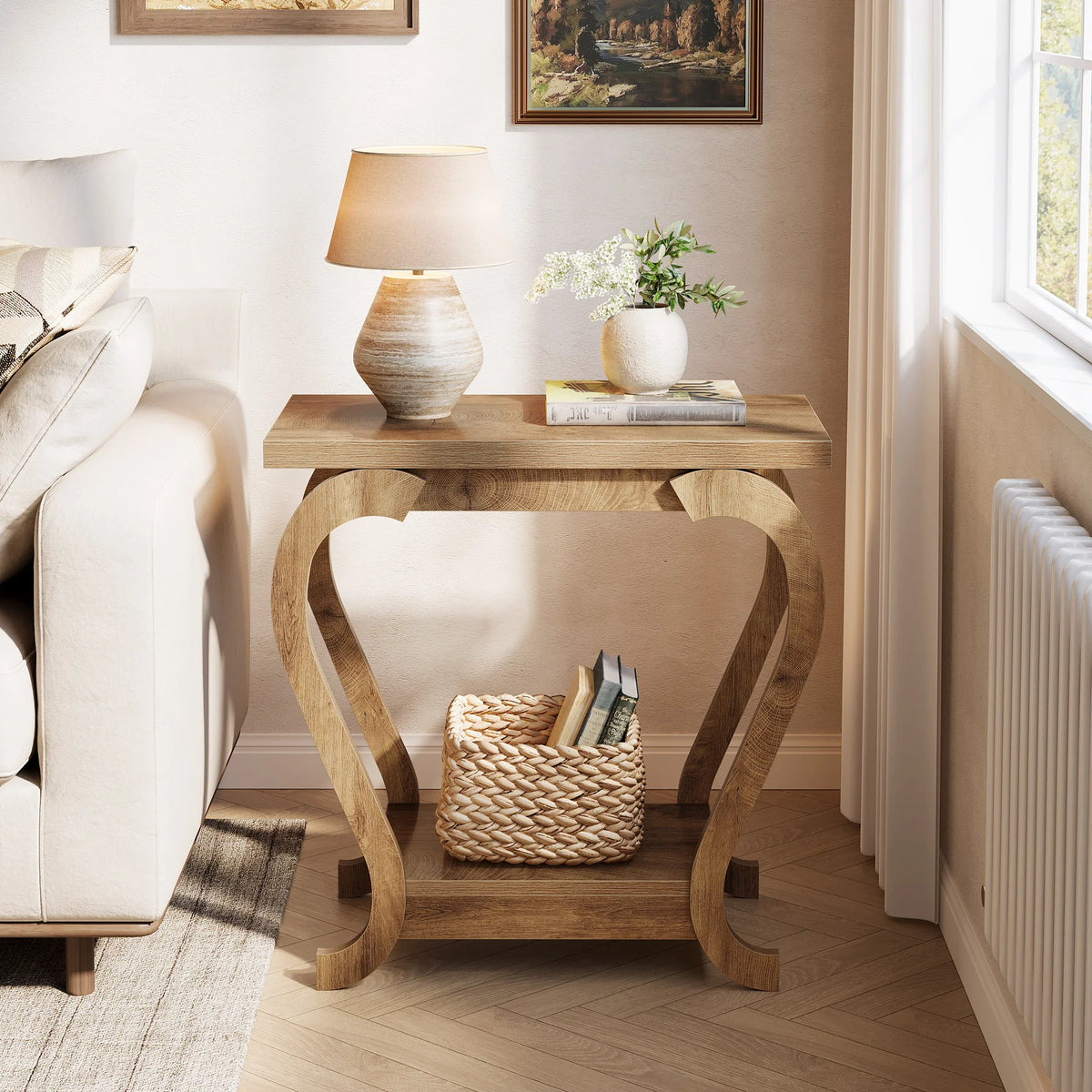 Wooden side table with lamp and books in a living room setting