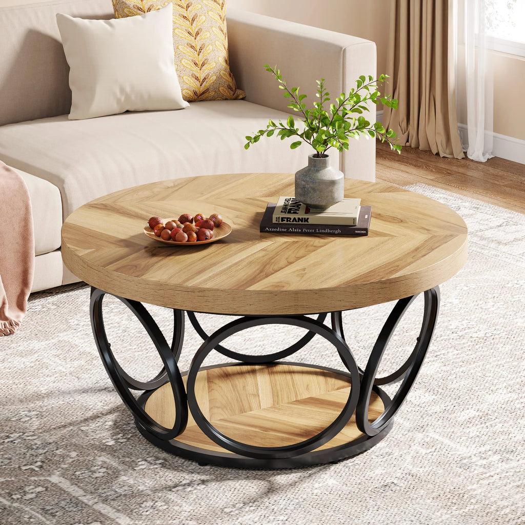 Round wooden coffee table with metal base in a living room setting