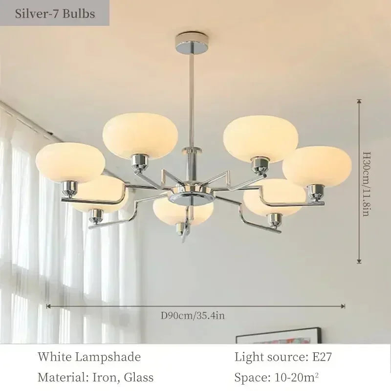 Chandelier with white lampshades and dimensions on a light background