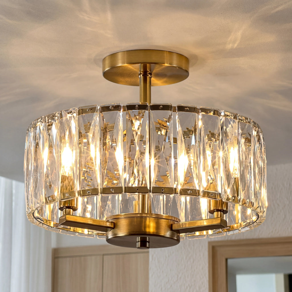 Gold and crystal ceiling light fixture on a neutral background