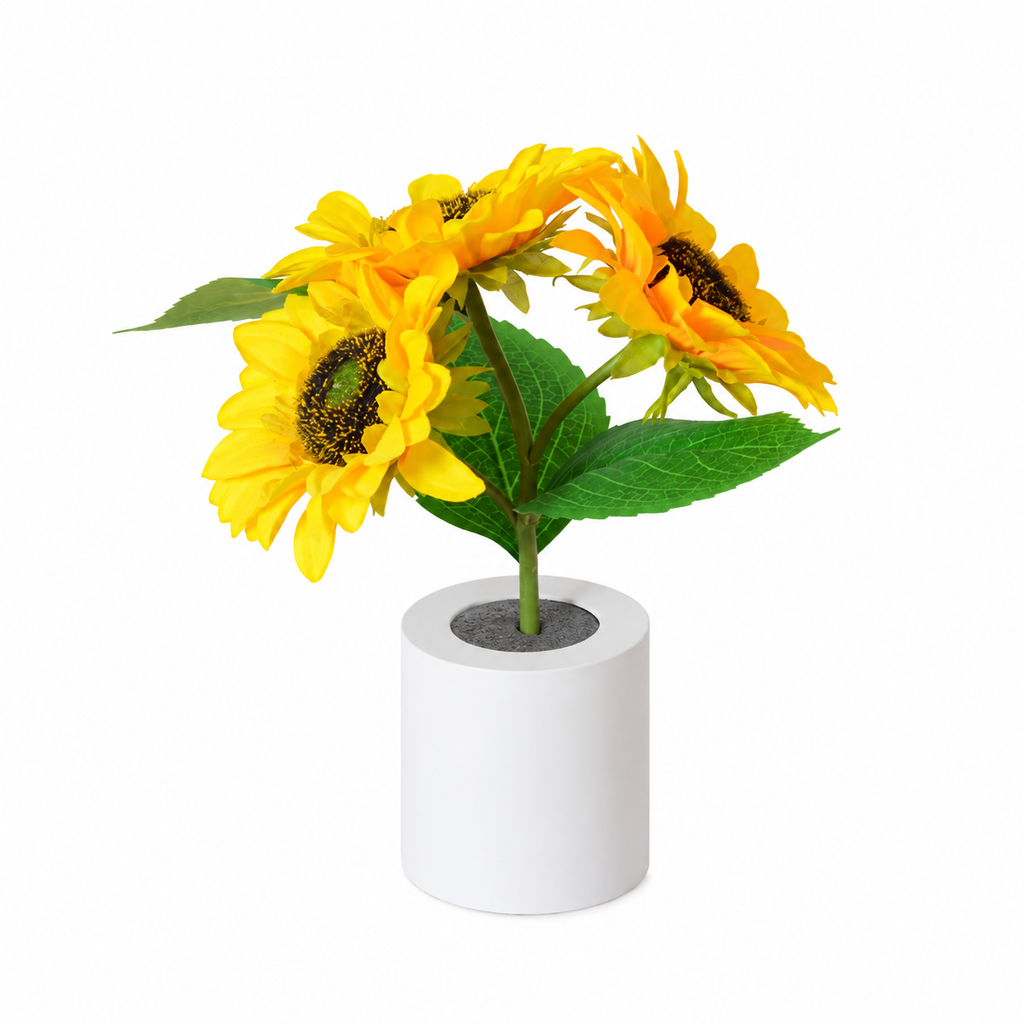 Sunflower lamp in a white pot.