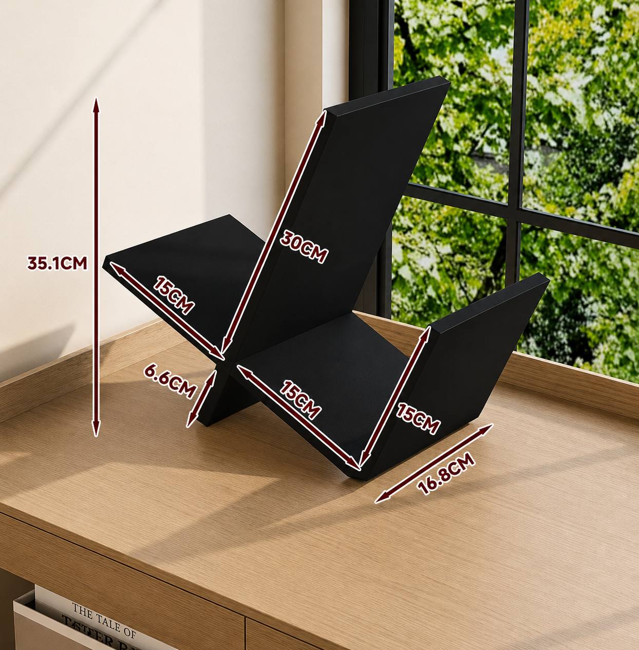 Modern black wooden book display shelf with geometric sculptural design showcasing books in a minimalist interior